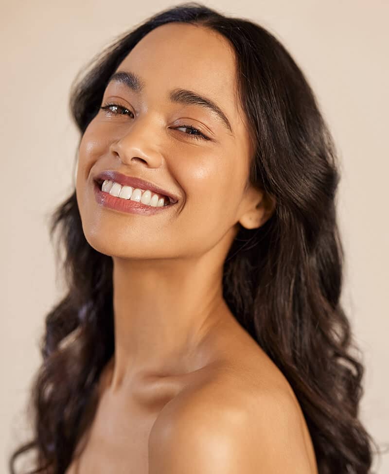 Young woman with black wavy hair